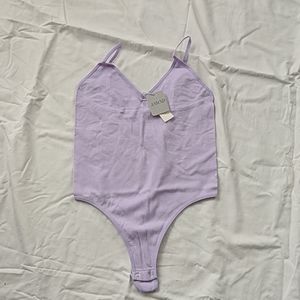 High cut yank top body suit